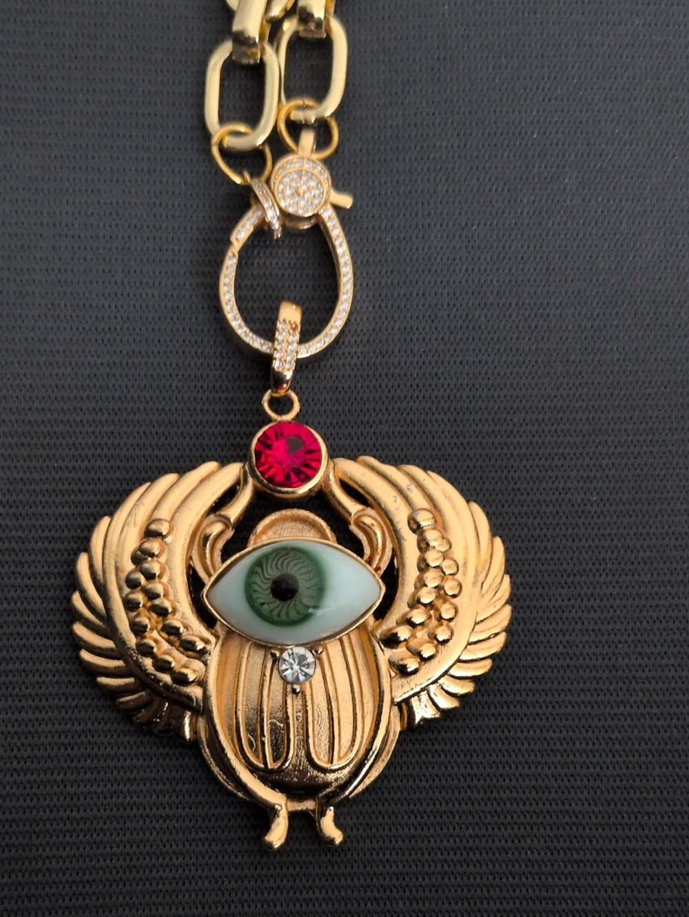 Gold Winged Scarab Pendant Necklace with Green Eye and Red Crystal